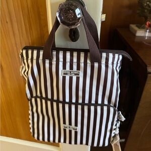 Henri Bendel zip around packable backpack